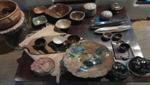 Glazed tea pots, mugs, bowls, decorative plates and other utilitarian objects adorn Lipi`s beautiful studio