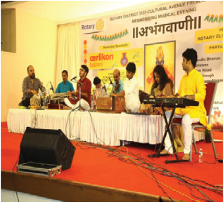 Karan performing at a Rotary Club event