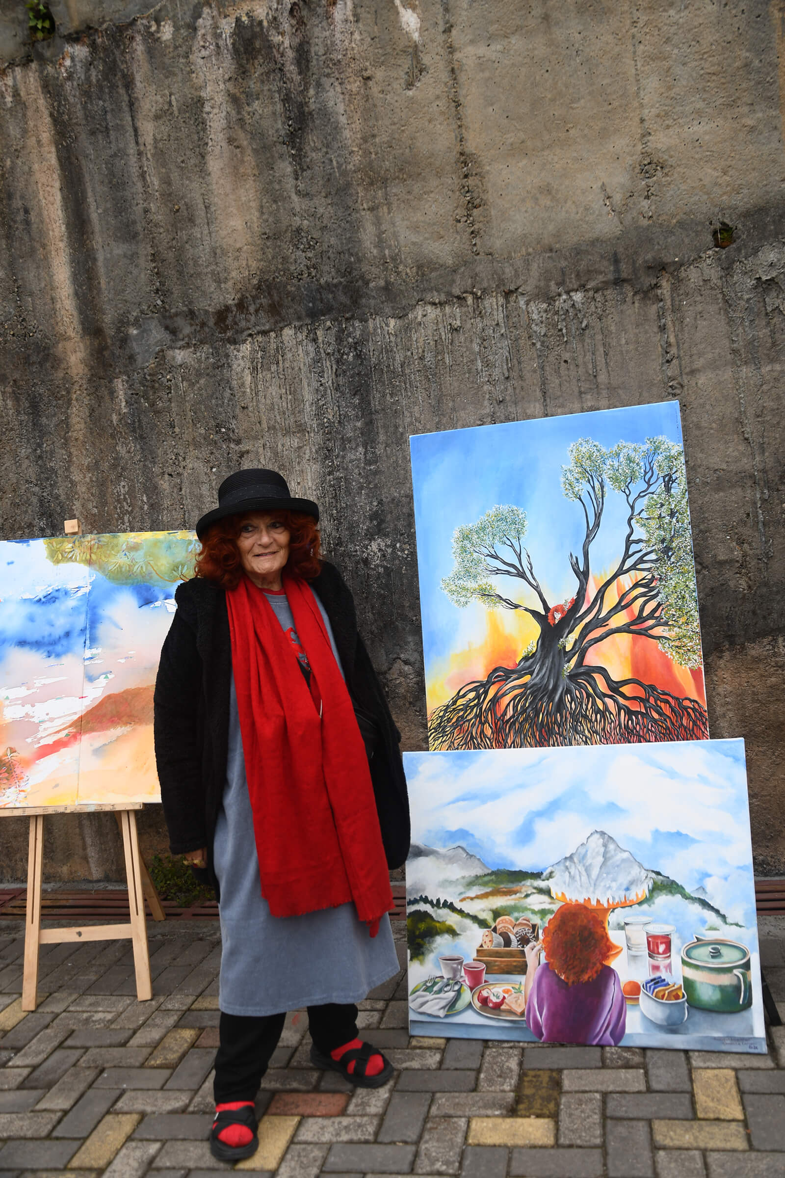 Giovanna Caruso stands next to her creations