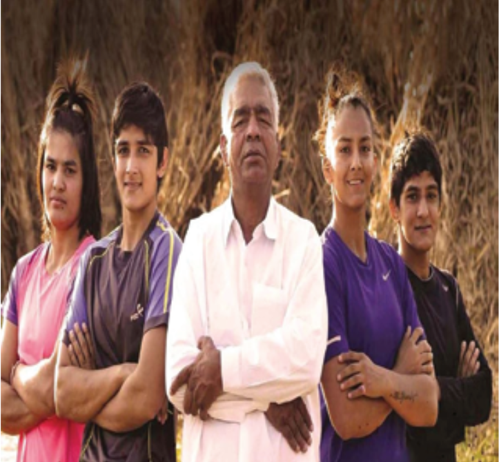 Wrestling Phogat sisters of India with their dad
